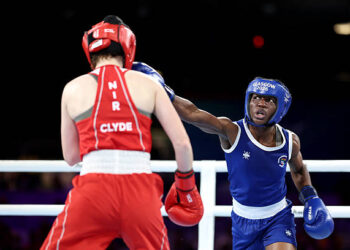Nancy Bamfo of Team Ghana punches Nicole Clyde of Team Northern Ireland during the Women's 54kg Round of 16 match on day three of the Glasgow 2026 Commonwealth Games at SEC Centre on July 26, 2026 in Glasgow, Scotland. (Photo by James Fearn/Getty Images)
