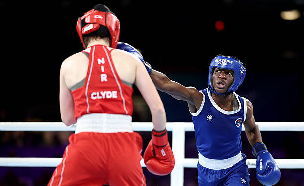 Nancy Bamfo of Team Ghana punches Nicole Clyde of Team Northern Ireland during the Women's 54kg Round of 16 match on day three of the Glasgow 2026 Commonwealth Games at SEC Centre on July 26, 2026 in Glasgow, Scotland. (Photo by James Fearn/Getty Images)