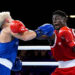 Amadu Mohammed of Team Ghana punches Jye Dixon of Team Australia during the Men's 55kg Semi-Final match on day eight of the Glasgow 2026 Commonwealth Games at SEC Centre on July 31, 2026 in Glasgow, Scotland. (Photo by Mattia Ozbot/Getty Images)