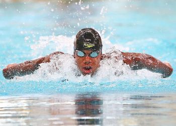 Abeiku Gyekye Jackson of Ghana competes in the Men's 100m Butterfly preliminaries at the Aquatic Centre of the Tuanaimato Sports Facility on day three of the Samoa 2015 Commonwealth Youth Games on September 9, 2015 in Apia, Samoa. (Photo by Scott Barbour/Getty Images)