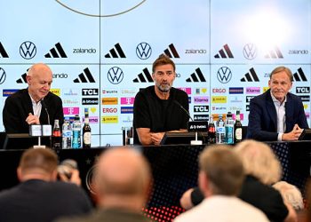 (L-R) Bernd Neuendorf, President of the German Football Association
(DFB), Juergen Klopp, Head Coach of Germany and Hans-Joachim Watzke, Vice President of the German Football Association (DFB), take part in the DFB Press Conference at DFB-Campus on July 24, 2026 in Frankfurt am Main, Germany. (Photo by Christian Kaspar-Bartke/Getty Images)