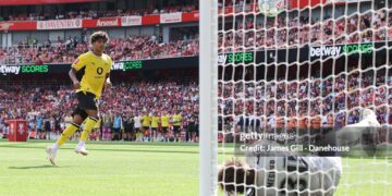 Mathis Albert of Borussia Dortmund has a penalty saved in the shootout by Illan Meslier of Arsenal during the pre-season friendly match between Arsenal FC and Borussia Dortmund at Emirates Stadium on August 09, 2026 in London, England. (Photo by James Gill - Danehouse/Getty Images)