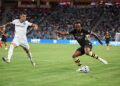 Inter Milan's midfielder Aleksandar Stankovic and Manchester City's midfielder Antoine Semenyo fight for the ball during the Asahi Super Dry Trophy football match between Manchester City and Inter Milan at Kai Tak Stadium in Hong Kong on August 1, 2026. (Photo by May JAMES / AFP via Getty Images)