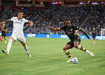 Inter Milan's midfielder Aleksandar Stankovic and Manchester City's midfielder Antoine Semenyo fight for the ball during the Asahi Super Dry Trophy football match between Manchester City and Inter Milan at Kai Tak Stadium in Hong Kong on August 1, 2026. (Photo by May JAMES / AFP via Getty Images)