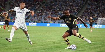 Inter Milan's midfielder Aleksandar Stankovic and Manchester City's midfielder Antoine Semenyo fight for the ball during the Asahi Super Dry Trophy football match between Manchester City and Inter Milan at Kai Tak Stadium in Hong Kong on August 1, 2026. (Photo by May JAMES / AFP via Getty Images)