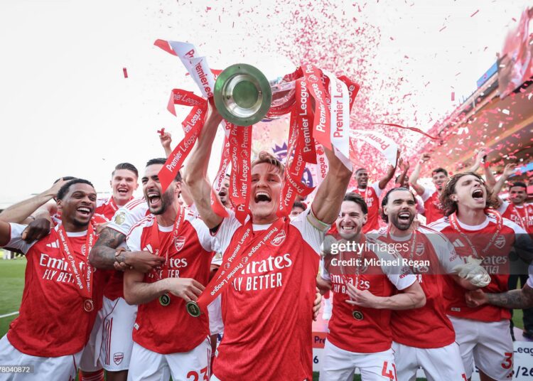 Martin Odegaard of Arsenal lifts the Premier League trophy during the Premier League match between Crystal Palace and Arsenal at Selhurst Park on May 24, 2026 in London, England. (Photo by Michael Regan/Getty Images For Premier League)