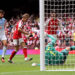 Martin Odegaard of Arsenal scores his team's third goal during the 2026 FA Community Shield match between Arsenal and Manchester City at Principality Stadium on August 16, 2026 in Cardiff, Wales. (Photo by Carl Recine/Getty Images)