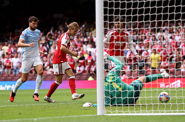 Martin Odegaard of Arsenal scores his team's third goal during the 2026 FA Community Shield match between Arsenal and Manchester City at Principality Stadium on August 16, 2026 in Cardiff, Wales. (Photo by Carl Recine/Getty Images)