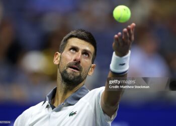 Novak Djokovic of Serbia serves against Mariano Navone of Argentina during their Men's Singles First Round match on Day One of the 2026 US Open at USTA Billie Jean King National Tennis Center on August 30, 2026 (Photo by Matthew Stockman/Getty Images)