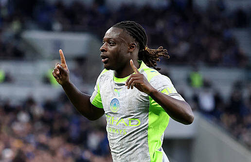 Jeremy Doku of Manchester City celebrates scoring his team's first goal during the Premier League match between Everton and Manchester City at Hill Dickinson Stadium on May 04, 2026 in Liverpool, England. (Photo by Stu Forster/Getty Images)