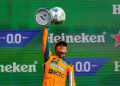 Lando Norris of Great Britain and McLaren Mastercard F1 Team raises his trophy in celebration on the podium during the F1 Grand Prix of Netherlands at Circuit Zandvoort on August 23, 2026 in Zandvoort, Netherlands. (Photo by Kym Illman/Getty Images)