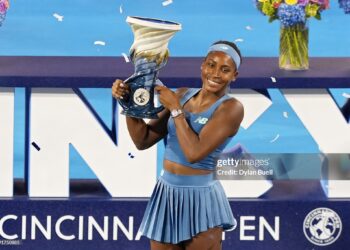 Coco Gauff of the United States poses for photos with the Rookwood Cup after defeating Jessica Pegula of the United States to win the women's singles title during the final day of the Cincinnati Open (Photo by Dylan Buell/Getty Images)