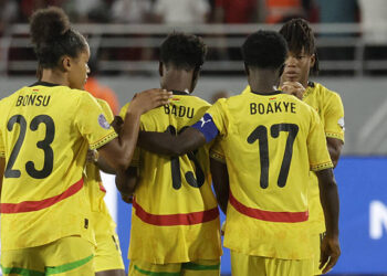 Ghana's midfielder #23 Josephine Afua Kyerewaa Bonsu and defender #17 Portia Boakye console their forward #13 Evelyn Badu after missing a shot in the penalty shootout at the end of their 2025 Women's Africa Cup of Nations semi-final football match against Morocco at Prince Moulay Abdellah Stadium in Rabat on July 22, 2025. (Photo by Abdel Majid BZIOUAT / AFP) (Photo by ABDEL MAJID BZIOUAT/AFP via Getty Images)
