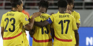 Ghana's midfielder #23 Josephine Afua Kyerewaa Bonsu and defender #17 Portia Boakye console their forward #13 Evelyn Badu after missing a shot in the penalty shootout at the end of their 2025 Women's Africa Cup of Nations semi-final football match against Morocco at Prince Moulay Abdellah Stadium in Rabat on July 22, 2025. (Photo by Abdel Majid BZIOUAT / AFP) (Photo by ABDEL MAJID BZIOUAT/AFP via Getty Images)