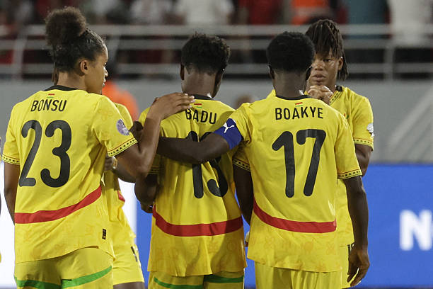 Ghana's midfielder #23 Josephine Afua Kyerewaa Bonsu and defender #17 Portia Boakye console their forward #13 Evelyn Badu after missing a shot in the penalty shootout at the end of their 2025 Women's Africa Cup of Nations semi-final football match against Morocco at Prince Moulay Abdellah Stadium in Rabat on July 22, 2025. (Photo by Abdel Majid BZIOUAT / AFP) (Photo by ABDEL MAJID BZIOUAT/AFP via Getty Images)