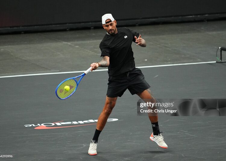 Nick Kyrgios of Australia returns a shot against Alexander Bublik of Kazakhstan during round one of The MGM Slam (Photo by Chris Unger/Getty Images)