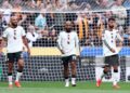 (L-R) Noussair Mazraoui, Bryan Mbeumo and Bruno Fernandes of Manchester United react after their side concedes a goal during the Premier League 2026/27 match between Hull City and Manchester United (Photo by Molly Darlington/Getty Images)