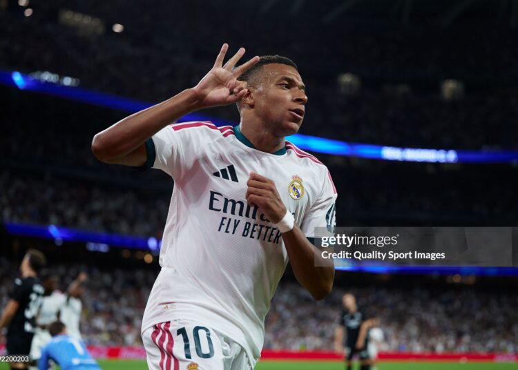 Kylian Mbappe of Real Madrid celebrates after scoring his side's fourth goal to complete his hat-trick during the LaLiga EA Sports 2026/27 match between Real Madrid and Real Sociedad (Photo by Alvaro Medranda/Quality Sport Images/Getty Images)