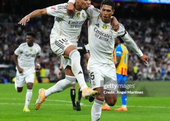 Kylian Mbappe of Real Madrid celebrates scoring his team's first goal with teammate Jude Bellingham during the LaLiga EA Sports match between Real Madrid CF and Valencia CF (Photo by Angel Martinez/Getty Images)