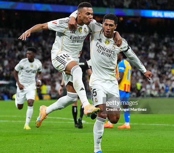 Kylian Mbappe of Real Madrid celebrates scoring his team's first goal with teammate Jude Bellingham during the LaLiga EA Sports match between Real Madrid CF and Valencia CF (Photo by Angel Martinez/Getty Images)