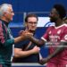 Real Madrid's Portuguese coach Jose Mourinho (L) shakes hands with Real Madrid's Brazilian forward #07 Vinicius Junior during the pre-season friendly football match between FC Schalke 04 and Real Madrid (Photo by INA FASSBENDER / AFP via Getty Images)