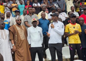 Asawase MP Mohammed Muntaka Mubarak addresses crowd at commissioning of Dogo Moro Mini Stadium