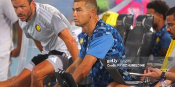 Nassr's Portuguese forward #07 Cristiano Ronaldo sits on the bench before the start of the Saudi Pro League (Photo by Fayez NURELDINE / AFP via Getty Images)