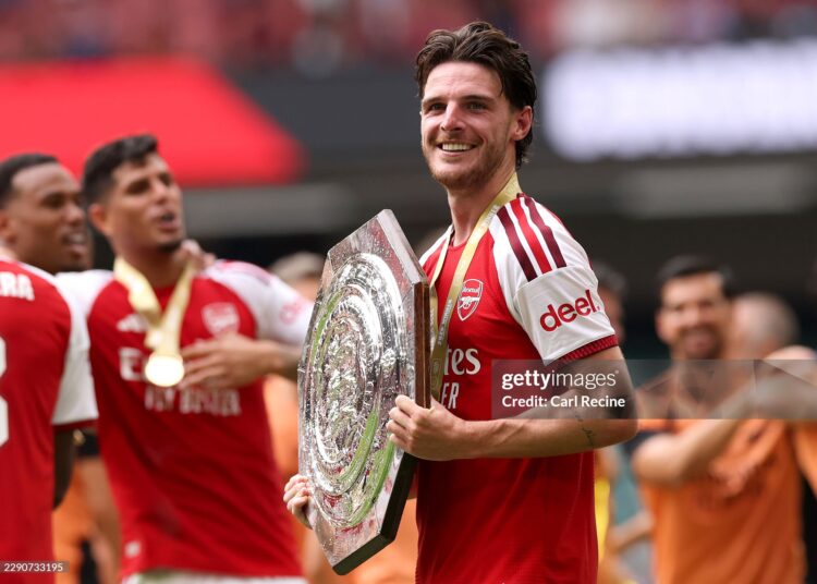 Declan Rice of Arsenal holds the FA Community Shield trophy after his team’s victory in the 2026 FA Community Shield match between Arsenal and Manchester City (Photo by Carl Recine/Getty Images)