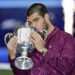 Carlos Alcaraz of Spain kisses the victor's trophy after winning the men's singles title at the U.S. Open tennis tournament in New York on Sept. 7, 2025. (Photo by Kyodo News via Getty Images)