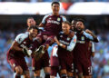 Ollie Watkins of Aston Villa is carried by teammates as he celebrates scoring his team's second goal during the Premier League match between Manchester City and Aston Villa at the Etihad Stadium on May 24, 2026 in Manchester, England. (Photo by Neville Williams/Aston Villa FC via Getty Images)