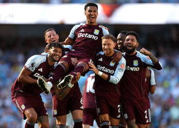 Ollie Watkins of Aston Villa is carried by teammates as he celebrates scoring his team's second goal during the Premier League match between Manchester City and Aston Villa at the Etihad Stadium on May 24, 2026 in Manchester, England. (Photo by Neville Williams/Aston Villa FC via Getty Images)
