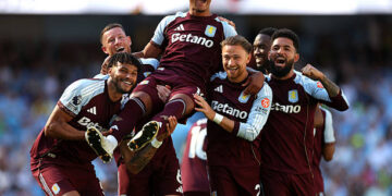Ollie Watkins of Aston Villa is carried by teammates as he celebrates scoring his team's second goal during the Premier League match between Manchester City and Aston Villa at the Etihad Stadium on May 24, 2026 in Manchester, England. (Photo by Neville Williams/Aston Villa FC via Getty Images)