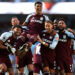 Ollie Watkins of Aston Villa is carried by teammates as he celebrates scoring his team's second goal during the Premier League match between Manchester City and Aston Villa at the Etihad Stadium on May 24, 2026 in Manchester, England. (Photo by Neville Williams/Aston Villa FC via Getty Images)