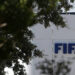 The FIFA logo is seen at its Africa regional office in Sale on August 5, 2026. President Gianni Infantino held emergency talks with other FIFA directors in Morocco on August 5, a source told AFP, amid a wave of criticism over his now shelved plan to open the World Cup to private investment. (Photo by Abdelmajid BZIOUAT / AFP via Getty Images)