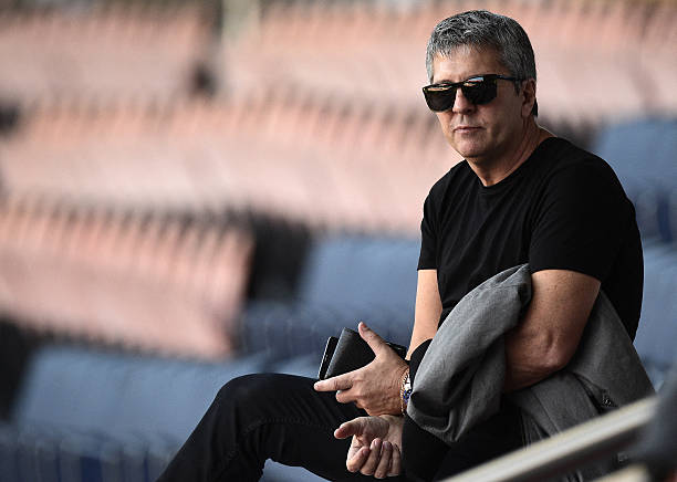 Father of Barcelona's player Lionel Messi, Jorge Horacio Messi, attends a training session of Barcelona at the Parc des Princes stadium in Paris on April 14, 2015, on the eve of the UEFA Champions League quarter final first leg football match Paris against Barcelona. AFP PHOTO / FRANCK FIFE (Photo by FRANCK FIFE / AFP via Getty Images)