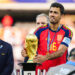 Rodri #9 of Spain picks up the FIFA World Cup Winner’s Trophy after defeating Argentina in the FIFA World Cup 2026 Final at New York New Jersey Stadium on July 19, 2026 in East Rutherford, New Jersey. Spain defeated reigning World Cup champions Argentina, who were led by Lionel Messi, with the lone goal coming from Ferran Torres #7 in the 106th minute of extra time. (Photo by Andrew Harnik/Getty Images)