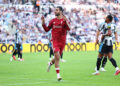 Dominik Szoboszlai of Liverpool celebrates after scoring a goal to make it 2-2 during the Premier League 2026/27 match between Newcastle United and Liverpool FC at St James' Park on August 23, 2026 in Newcastle upon Tyne, United Kingdom. (Photo by Robbie Jay Barratt - AMA/Getty Images)