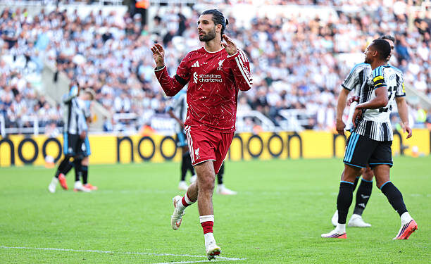 Dominik Szoboszlai of Liverpool celebrates after scoring a goal to make it 2-2 during the Premier League 2026/27 match between Newcastle United and Liverpool FC at St James' Park on August 23, 2026 in Newcastle upon Tyne, United Kingdom. (Photo by Robbie Jay Barratt - AMA/Getty Images)