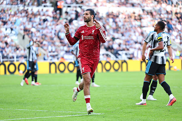 Dominik Szoboszlai of Liverpool celebrates after scoring a goal to make it 2-2 during the Premier League 2026/27 match between Newcastle United and Liverpool FC at St James' Park on August 23, 2026 in Newcastle upon Tyne, United Kingdom. (Photo by Robbie Jay Barratt - AMA/Getty Images)