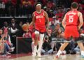 Amen Thompson #1 of the Houston Rockets dribbles the ball during the game against the Los Angeles Lakers during Round One Game Six of the 2026 NBA Playoffs (Photo by Jesse D. Garrabrant/NBAE via Getty Images)