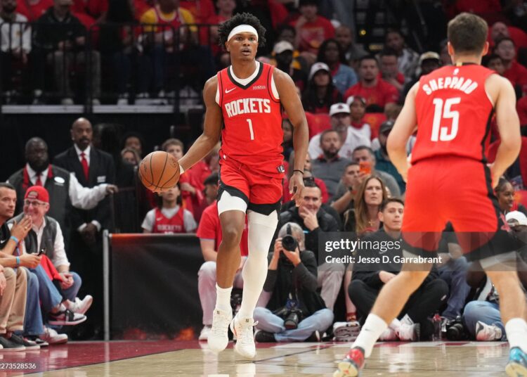 Amen Thompson #1 of the Houston Rockets dribbles the ball during the game against the Los Angeles Lakers during Round One Game Six of the 2026 NBA Playoffs (Photo by Jesse D. Garrabrant/NBAE via Getty Images)