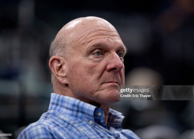 LA Clippers owner Steve Ballmer sits on the sideline before an NBA basketball game against the San Antonio Spurs (Eric Thayer / Los Angeles Times via Getty Images)