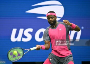 USA's Frances Tiafoe hits a return to USA's Alex Michelsen during their men's singles quarter-finals (Photo by ANGELA WEISS / AFP via Getty Images)