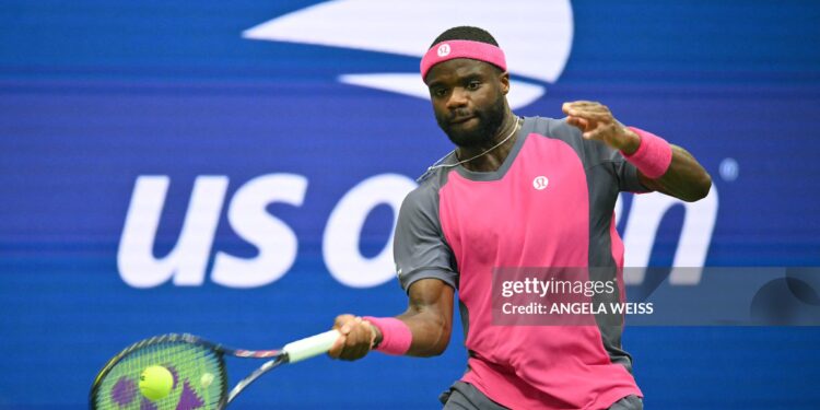USA's Frances Tiafoe hits a return to USA's Alex Michelsen during their men's singles quarter-finals (Photo by ANGELA WEISS / AFP via Getty Images)