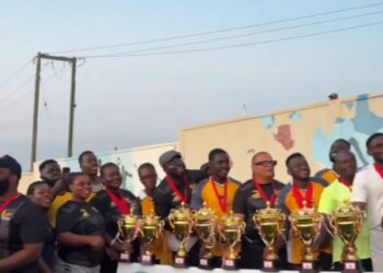 GCB Bank posing with their trophies