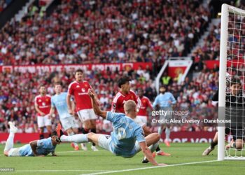 Erling Braut Haaland of Manchester City scores their side's first goal during the Premier League 2026/27 match between Manchester United and Manchester City at Old Trafford on September 13, 2026 in Manchester, England. (Photo by Alex Livesey - Danehouse/Getty Images)
