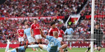 Erling Braut Haaland of Manchester City scores their side's first goal during the Premier League 2026/27 match between Manchester United and Manchester City at Old Trafford on September 13, 2026 in Manchester, England. (Photo by Alex Livesey - Danehouse/Getty Images)
