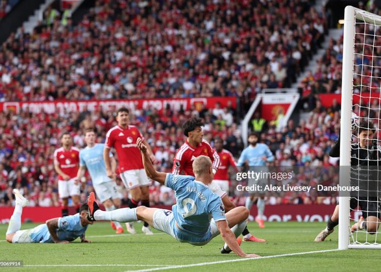 Erling Braut Haaland of Manchester City scores their side's first goal during the Premier League 2026/27 match between Manchester United and Manchester City at Old Trafford on September 13, 2026 in Manchester, England. (Photo by Alex Livesey - Danehouse/Getty Images)