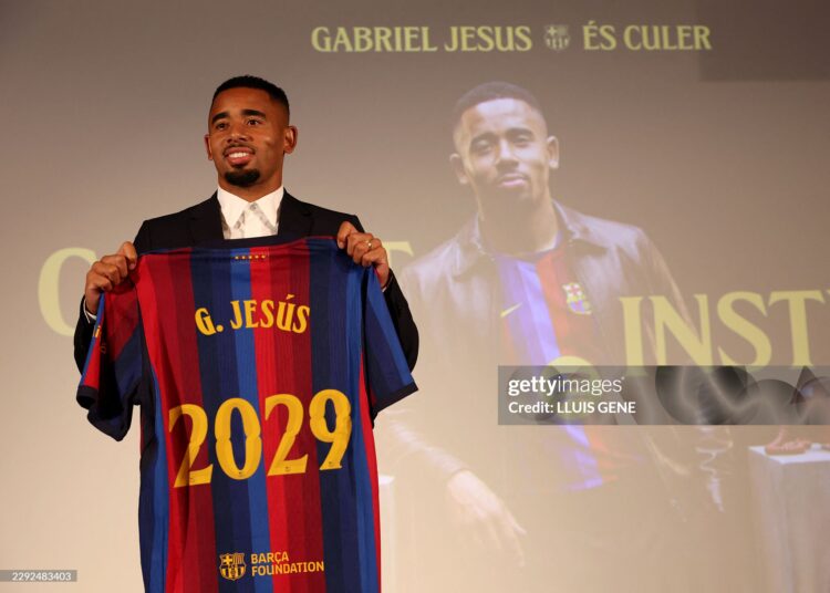 Brazilian forward Gabriel Jesus poses with his jersey during his official presentation as FC Barcelona's new football player on September 1, 2026 in Barcelona (Photo by Lluis GENE / AFP via Getty Images)