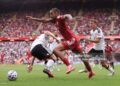 Bradley Barcola of Liverpool battles with David Affengruber of Fulham (L) and Timothy Castagne  (Photo by Simon Stacpoole/Offside/Offside via Getty Images)